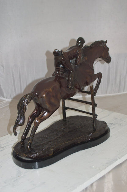 Jockey With Horse Jumping Over Hurdle Bronze Statue Medium  23"L x 10"W x 16"H.
