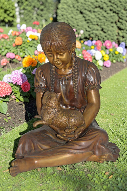 Girl Holding Her Cat Life Size Bronze Statue - Size: 23"L x 20"W x 24"H.