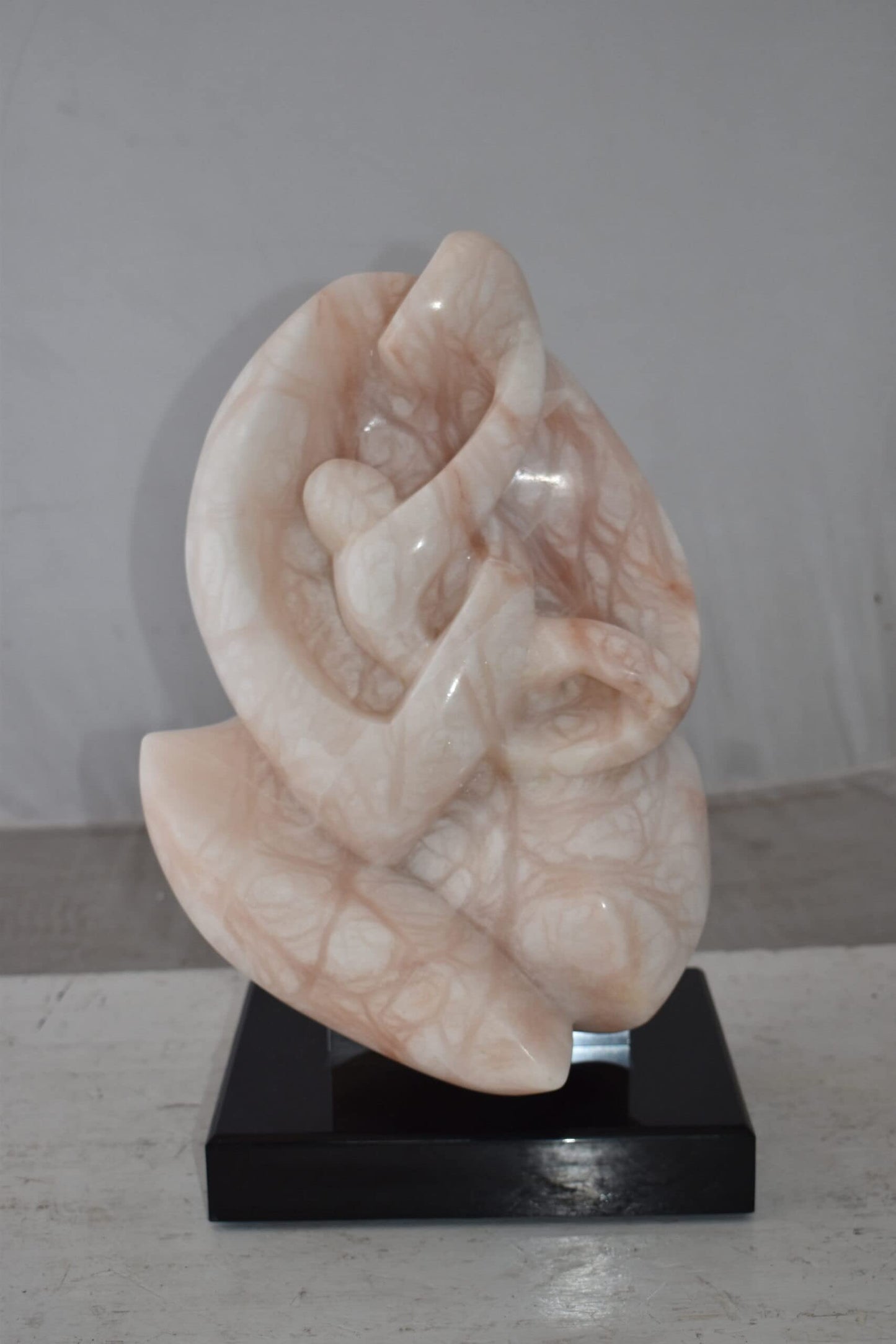Mother and Child Marble Sculpture mounted on carousel base  12" x 11" x 19"H