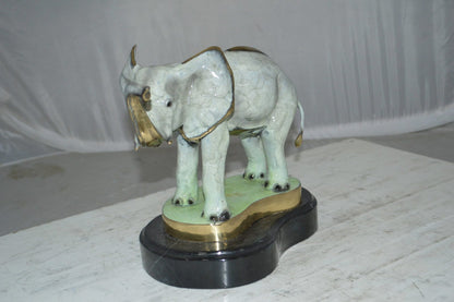 Elephant trunk Up Bronze Statue -  Size: 16"L x 9"W x 10"H.
