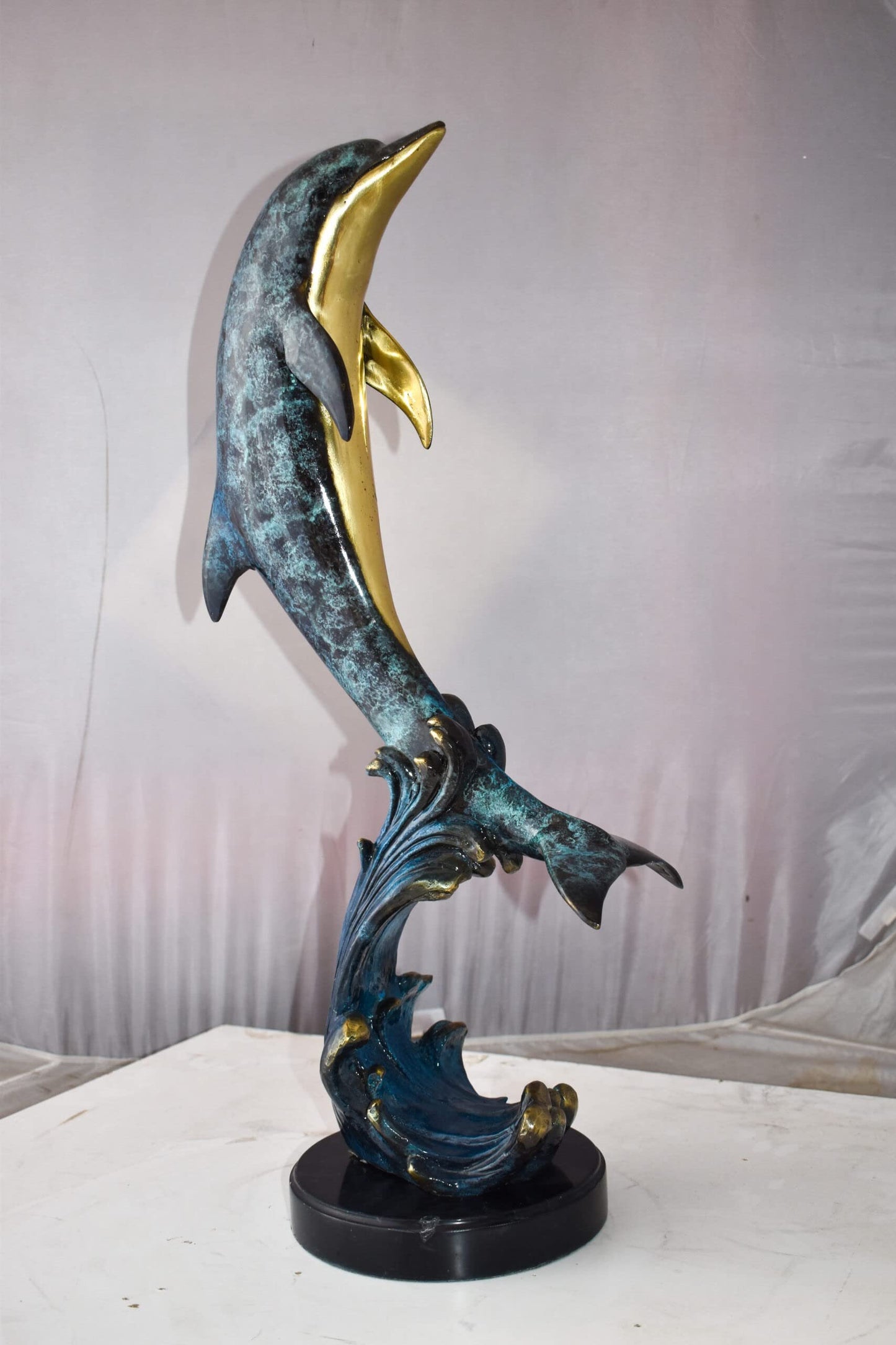 Dolphin Jumping the Waves Colored Bronze Statue Size: 15" x 10" x 31"H