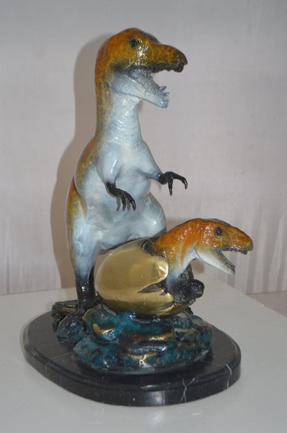 Dinosaur and baby Dino Bronze Statue -  Size: 26"L x 11"W x 18"H.