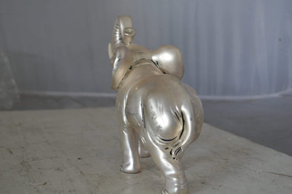 Elephant statue made of resin - Size: 9"L x 4"W x 8"H.