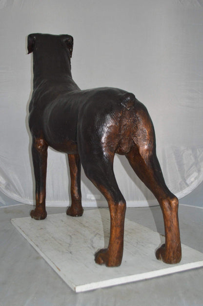 Rottweiler Dog Bronze Statue -  Size: 44"L x 10"W x 36"H.