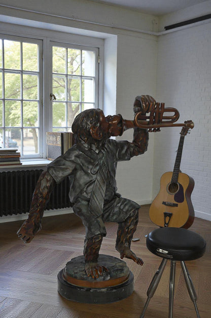 Monkey With Trumpet Bronze Statue - Size: 24"L x 12"W x 26"H.
