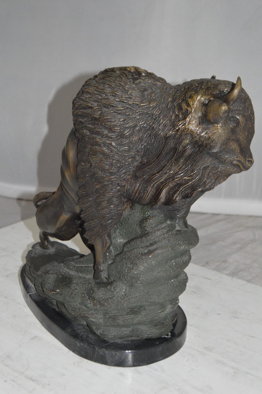 Bison Bronze Statue -  Size: 7"L x 14"W x 15"H.