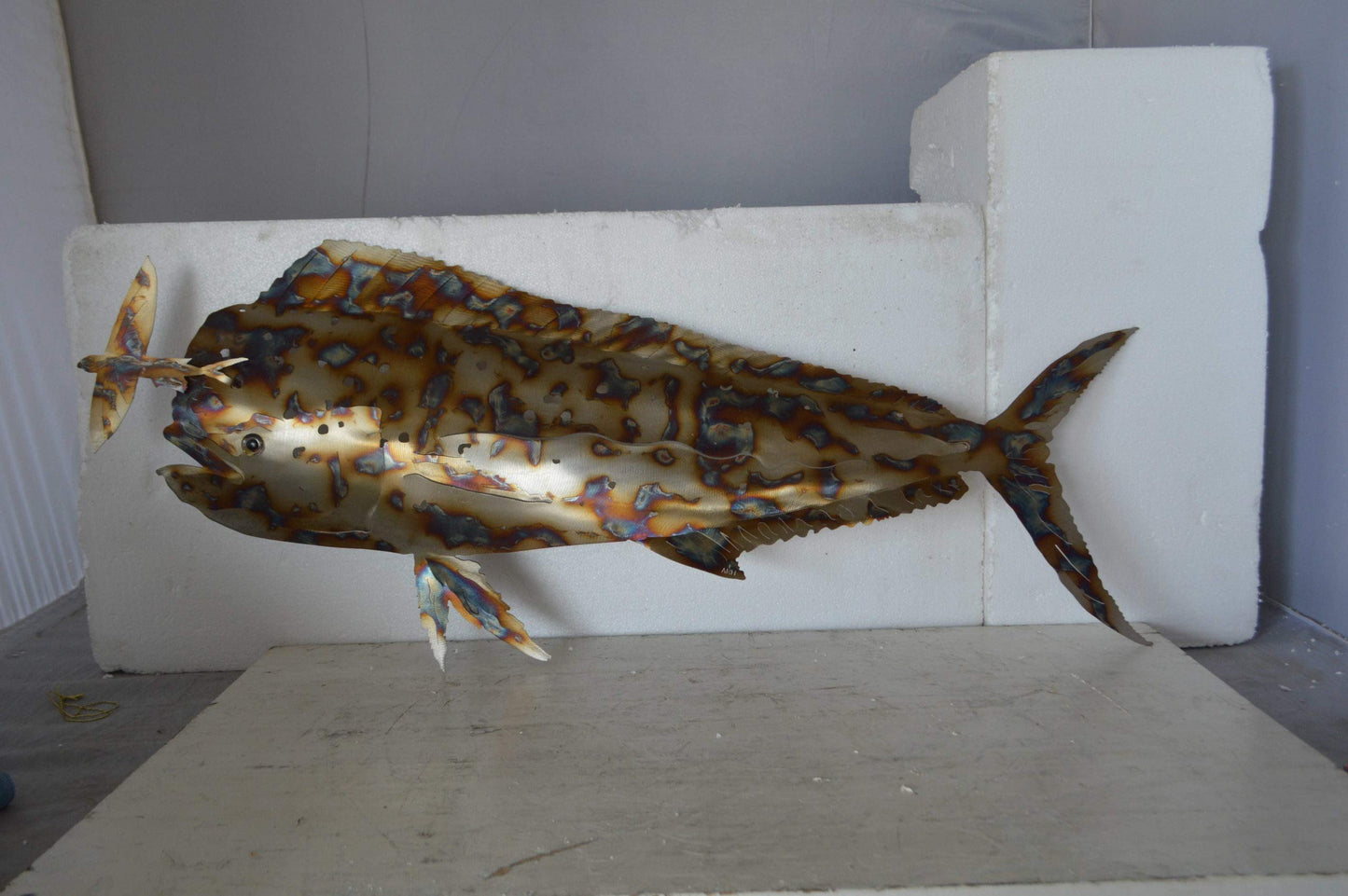 Mahi Mahi catching flying fish made of cut steel - Size: 39"L x 2"W x 12"H.