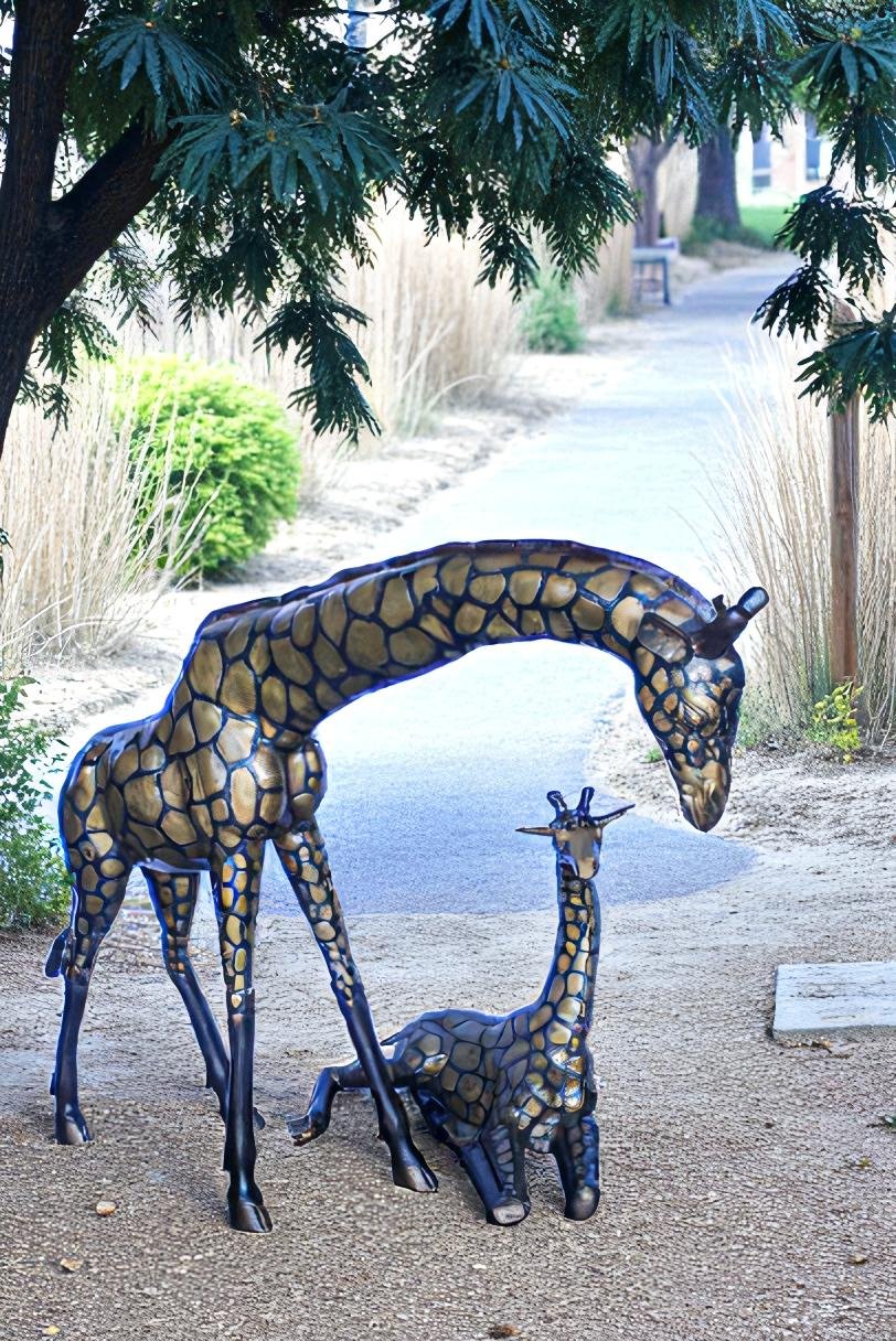 Life Size Bronze Giraffes Statues, One Laying, One Standing 77" x 21" x 58"H