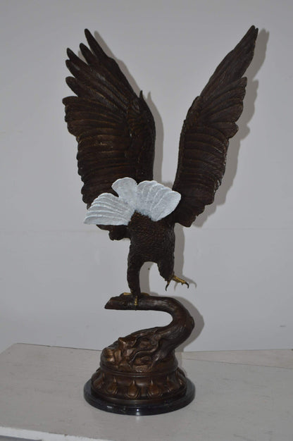 Eagle Coming to a Landing on a Branch Bronze Statue - Size: 15"L x 15"W x 31"H