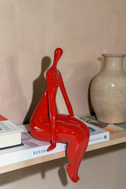 Modern Art Red Sitting on Edge Girl Made of Resin - Size: 8"L x 6"W x 15"H.
