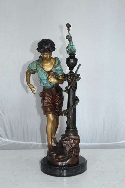 Les Amenes Boy Bronze Statue -  Size: 9"L x 8"W x 25"H.