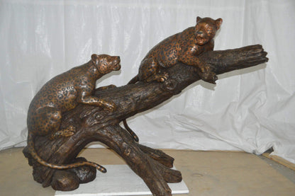 Two Jaguars On A Tree Bronze Statue - Size: 66"L x 34"W x 44"H.