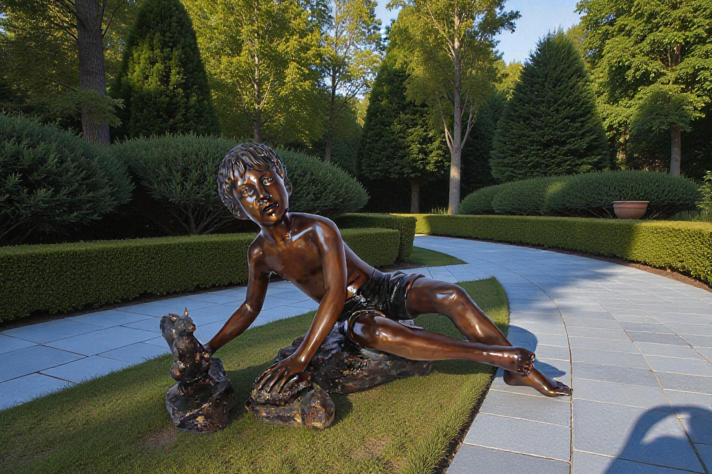 Adventurous boy with squirrel bronze statue -  Size: 36"L x 18"W x 22"H.