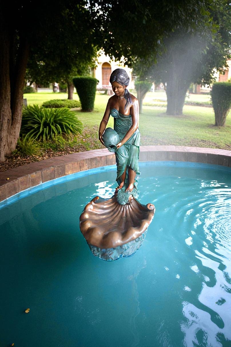 Girl Holding a Pot on Shell Fountain Bronze Statue -  Size: 33"L x 30"W x 62"H.