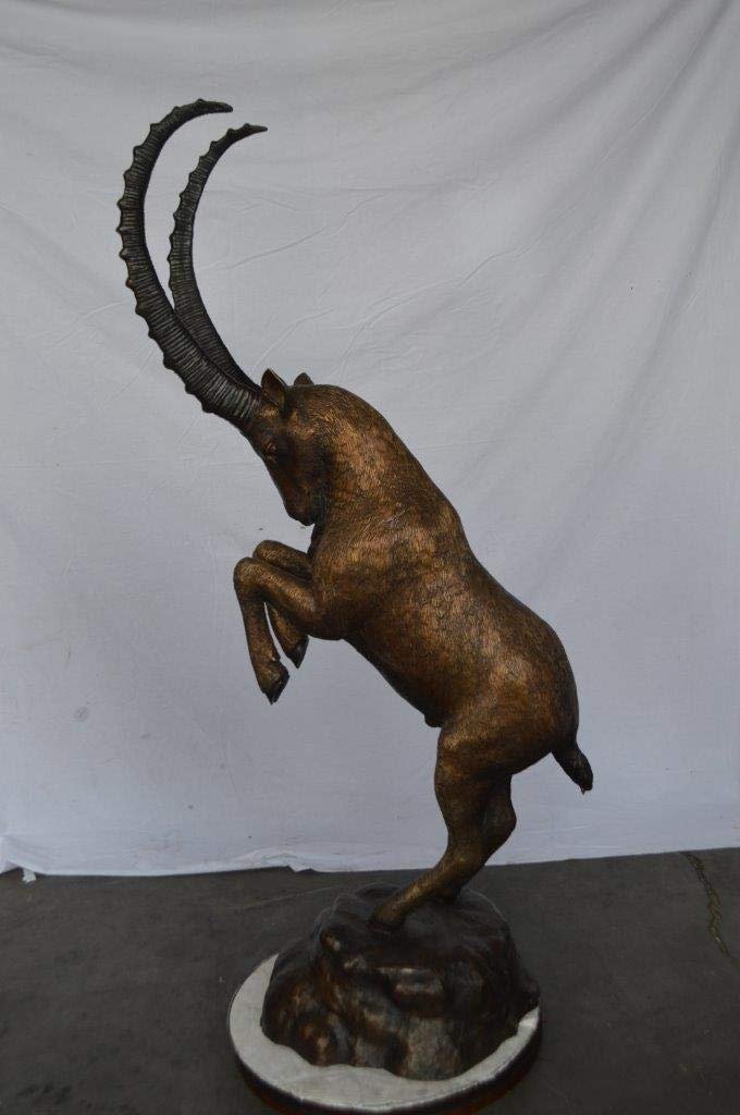 Mountain goat on hind legs bronze statue -  Size: 36"L x 16"W x 66"H.