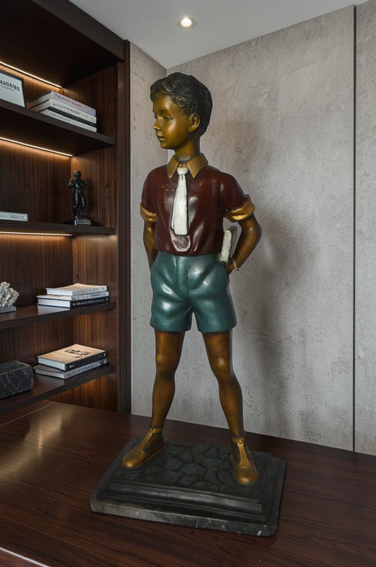 Kid Holding a Book Bronze Statue -  Size: 18"L x 11"W x 36"H.
