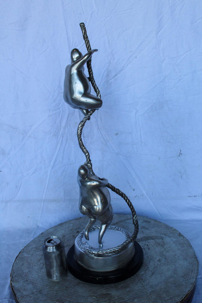 Two Voluptuous Women Climbing a Rope Statue, Silver Finish 10" x 10" x 29"H