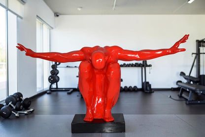 Red Saluting Body Builder Made of Resin Mounted on A Base Size: 37" x 14" x 19"H