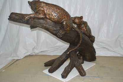Two Jaguars On A Tree Bronze Statue - Size: 66"L x 34"W x 44"H.