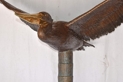 Life Size Pelican Flying Bronze Status - Size: 69"L x 45"W x 88"H.