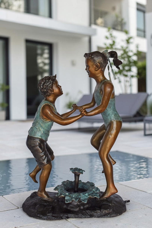 Young Boy and girl dancing around fountain bronze statue-Size 28" x 13" x 38"H