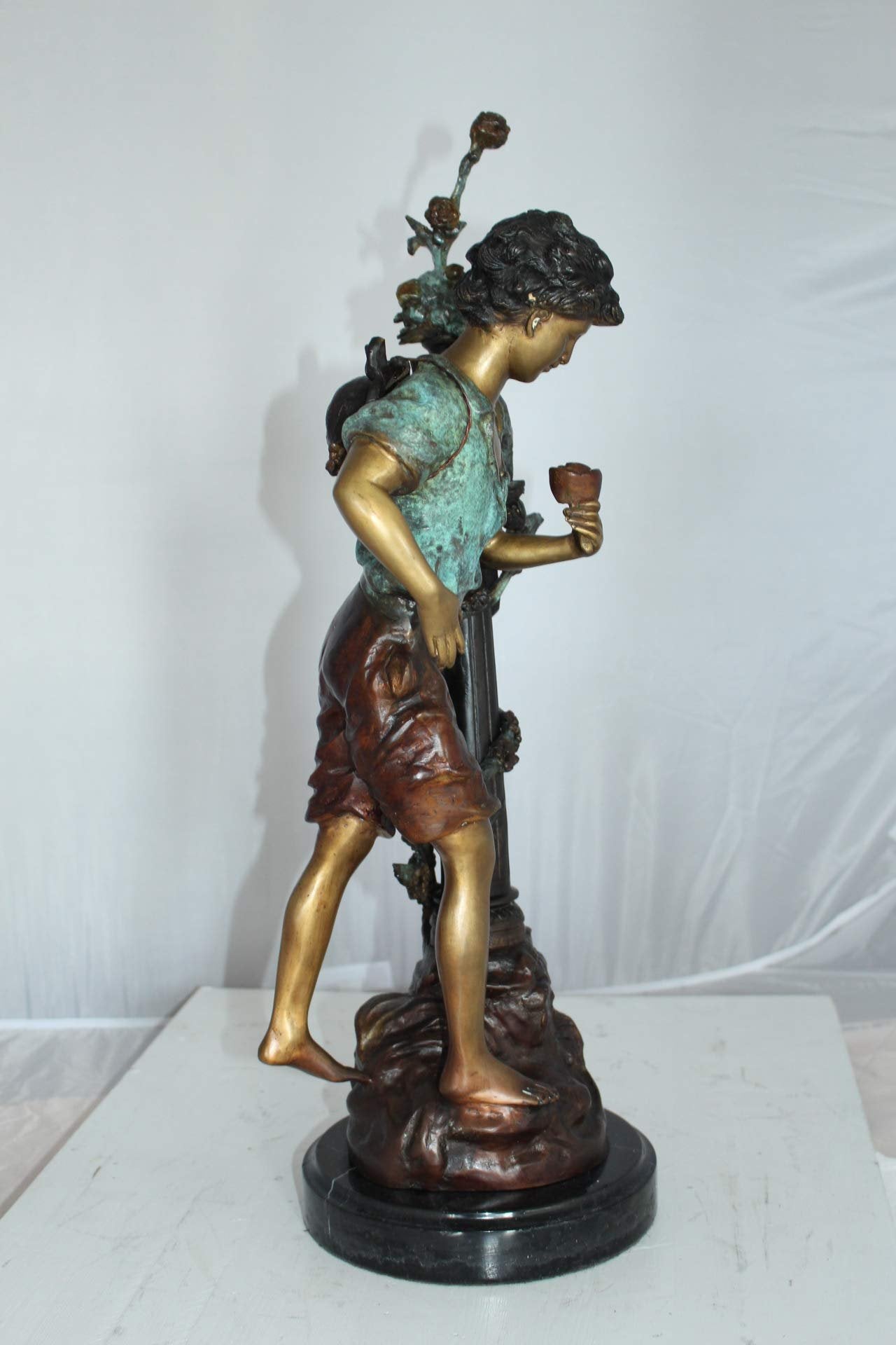 Les Amenes Boy Bronze Statue -  Size: 9"L x 8"W x 25"H.