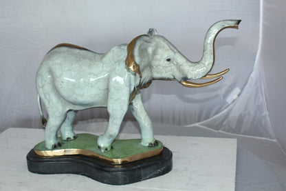 Elephant Medium Bronze Statue -  Size: 26"L x 8"W x 17"H.