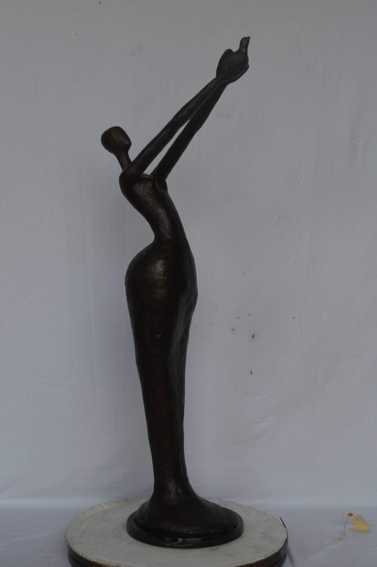 Woman Releasing Bird Modern Art Bronze Statue - Size: 13"L x 19"W x 52"H.