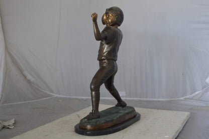Young Quarterback bronze statue - Size: 14"L x 6"W x 20"H.