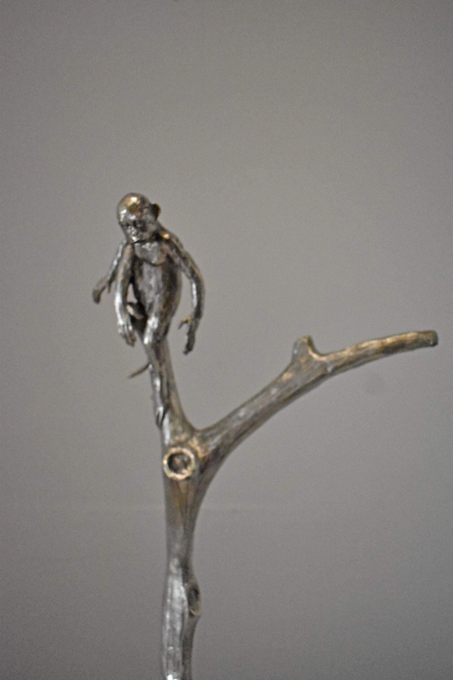 Monkey Resting on a Tree Silver Finish Bronze Statue - Size: 12" x 13" x 27"H.