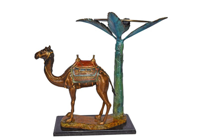 Camel Standing Under A Palm Tree Bronze Statue - Size: 20"L x 29"W x 25"H.