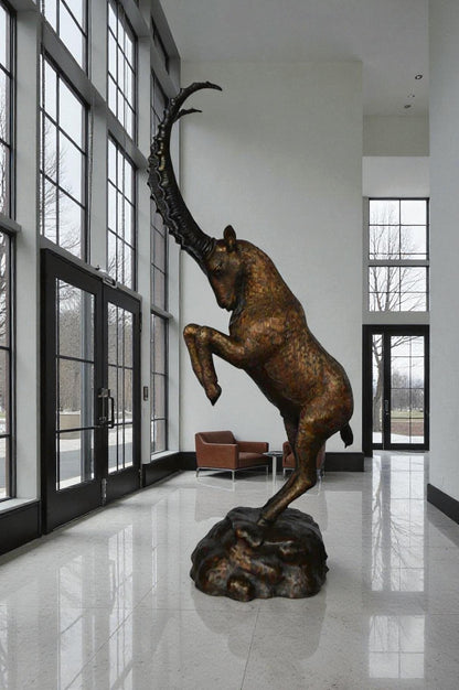 Mountain goat on hind legs bronze statue -  Size: 36"L x 16"W x 66"H.