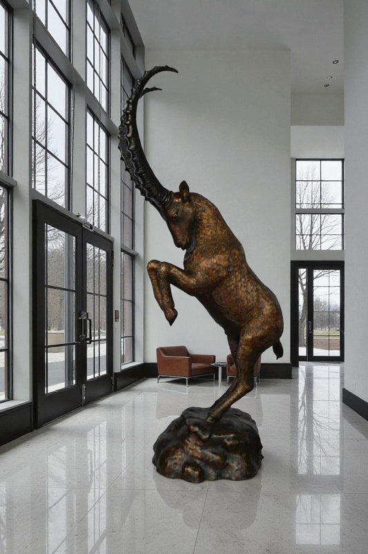 Mountain goat on hind legs bronze statue -  Size: 36"L x 16"W x 66"H.
