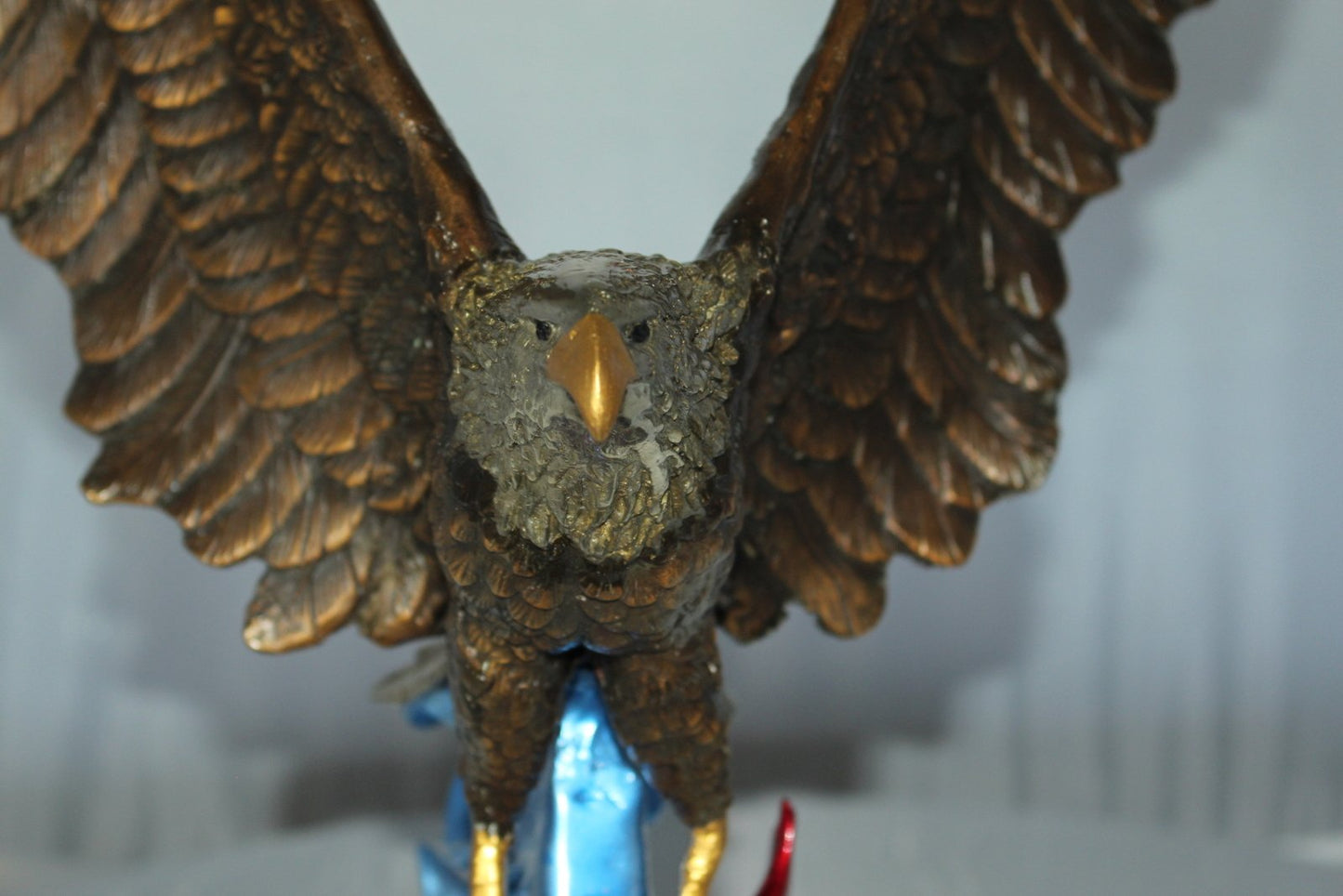 Eagle Catching his Prey Bronze Statue -  Size: 17"L x 20"W x 25"H.