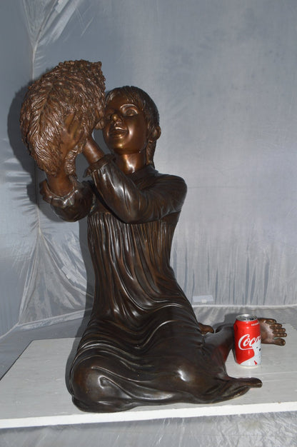 Girl Playing With Her Little Dog Bronze Statue -  Size: 22"L x 22"W x 30"H.