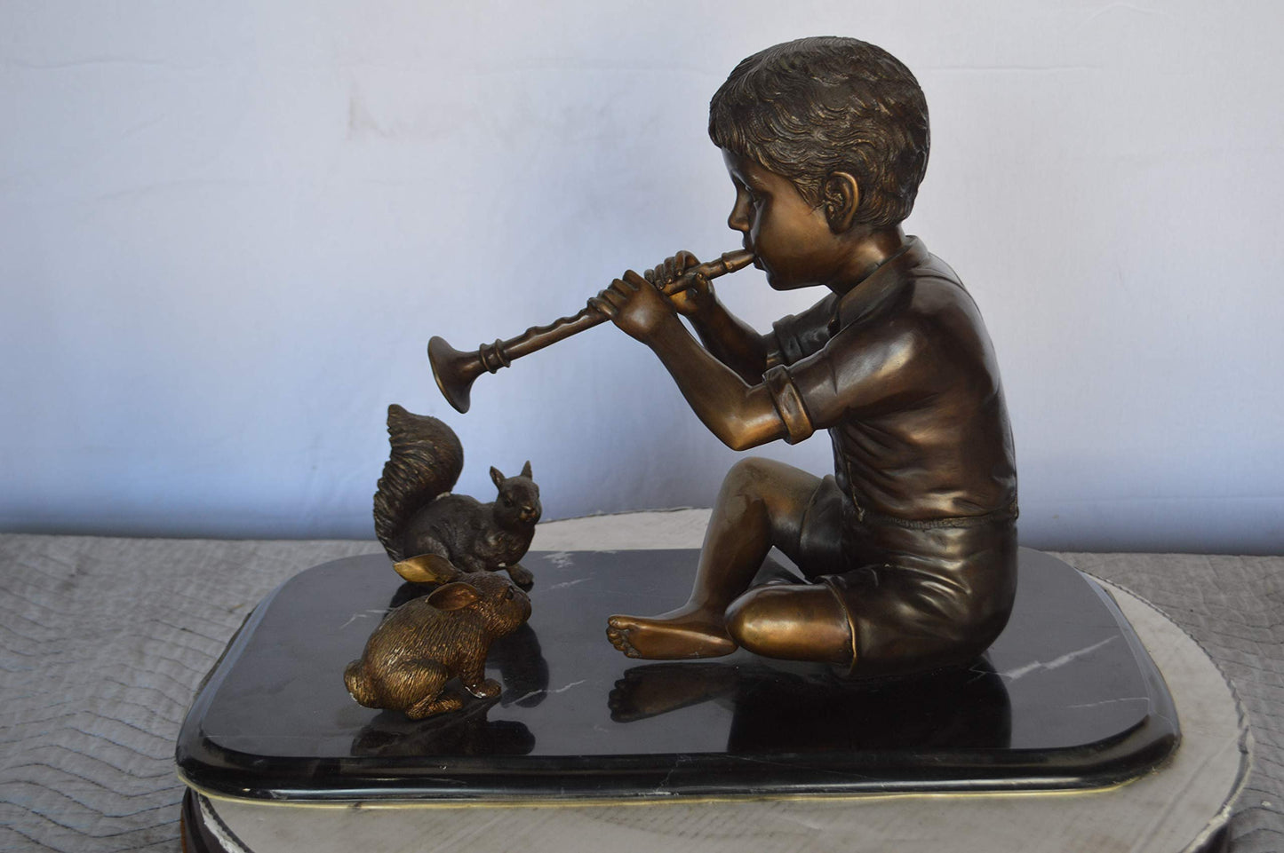 Boy With Rabbit And Squirrel Bronze Statue -  Size: 22"L x 13"W x 16"H.