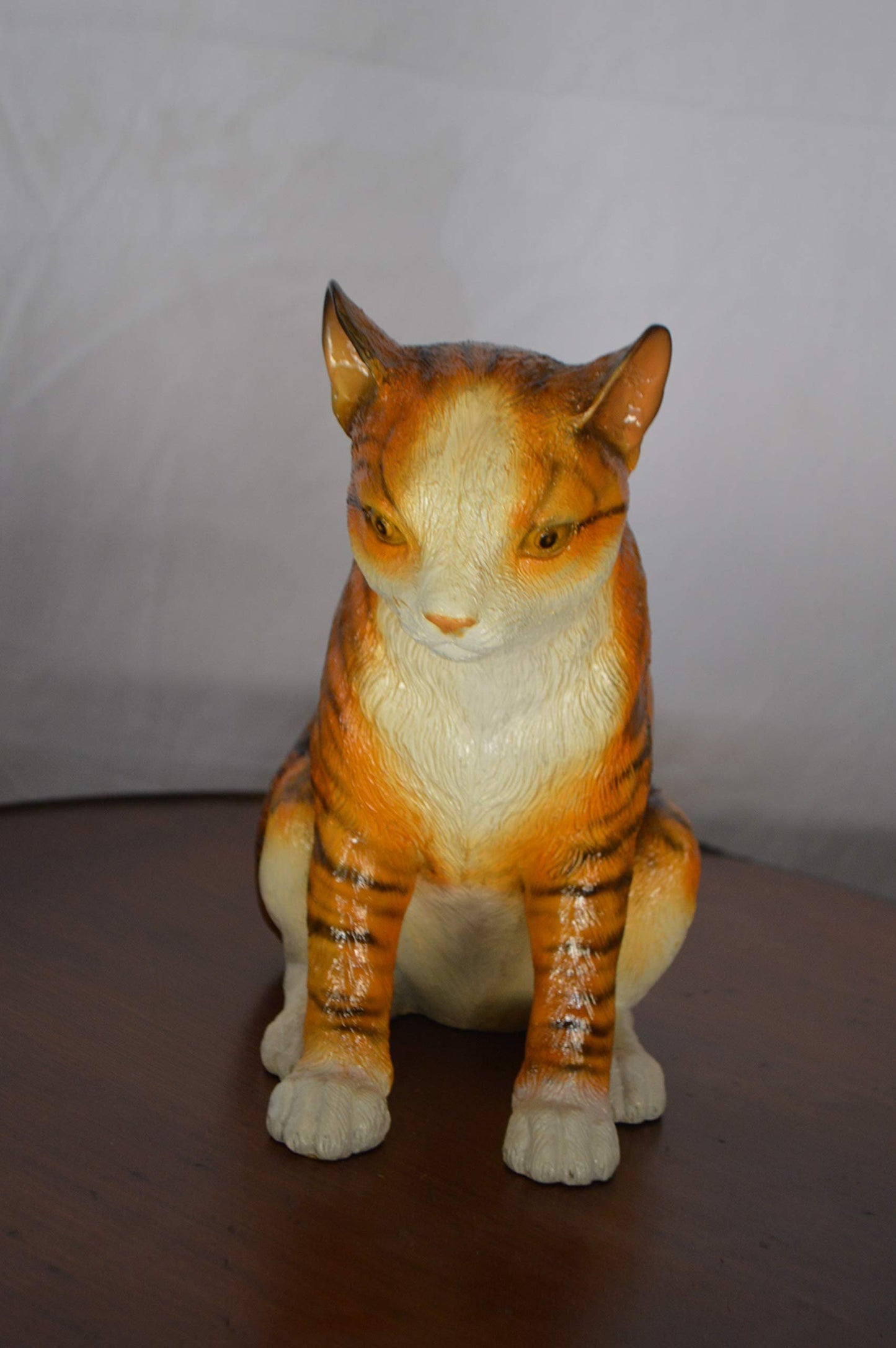 Colored Cat Sitting Bronze Statue -  Size: 6"L x 11"W x 11"H.