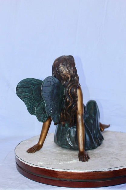 Fairy angel sitting peacefully bronze statue -  Size: 27"L x 12"W x 16"H.