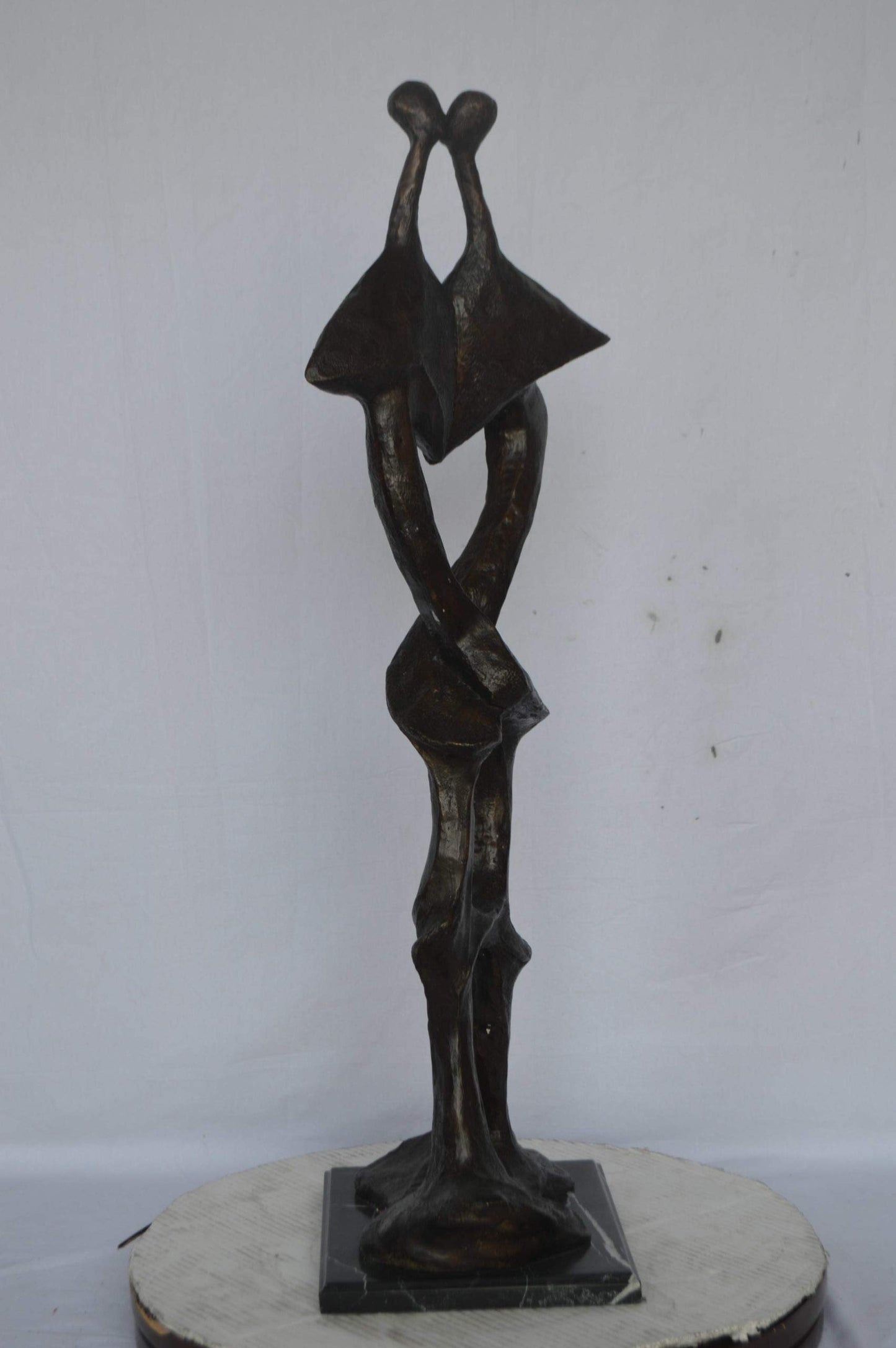 Modern art abstract, a couple kissing bronze statue - Size: 13"L x 11"W x 40"H.