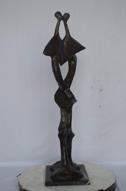 Modern art abstract, a couple kissing bronze statue - Size: 13"L x 11"W x 40"H.