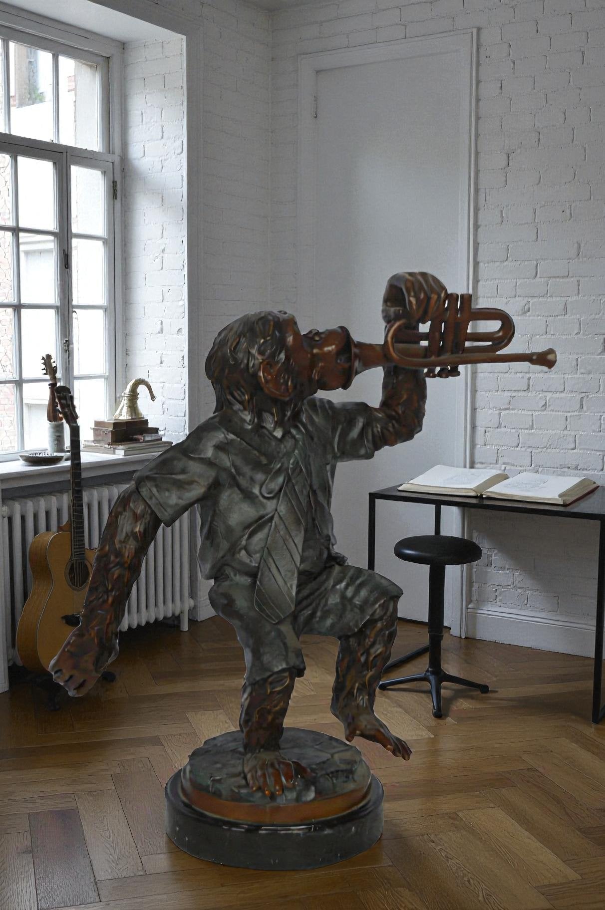 Monkey With Trumpet Bronze Statue - Size: 24"L x 12"W x 26"H.