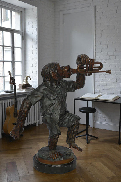 Monkey With Trumpet Bronze Statue - Size: 24"L x 12"W x 26"H.