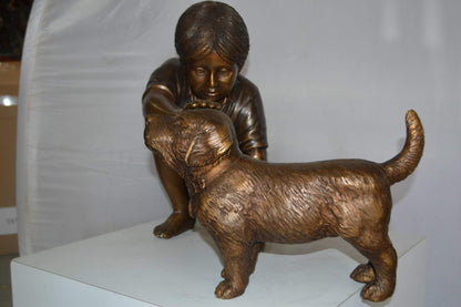 Boy and Dog Bronze Statue - Size: 30"L x 18"W x 18"H.