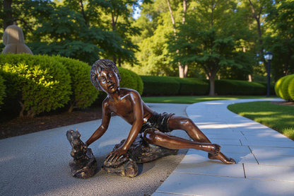Adventurous boy with squirrel bronze statue -  Size: 36"L x 18"W x 22"H.