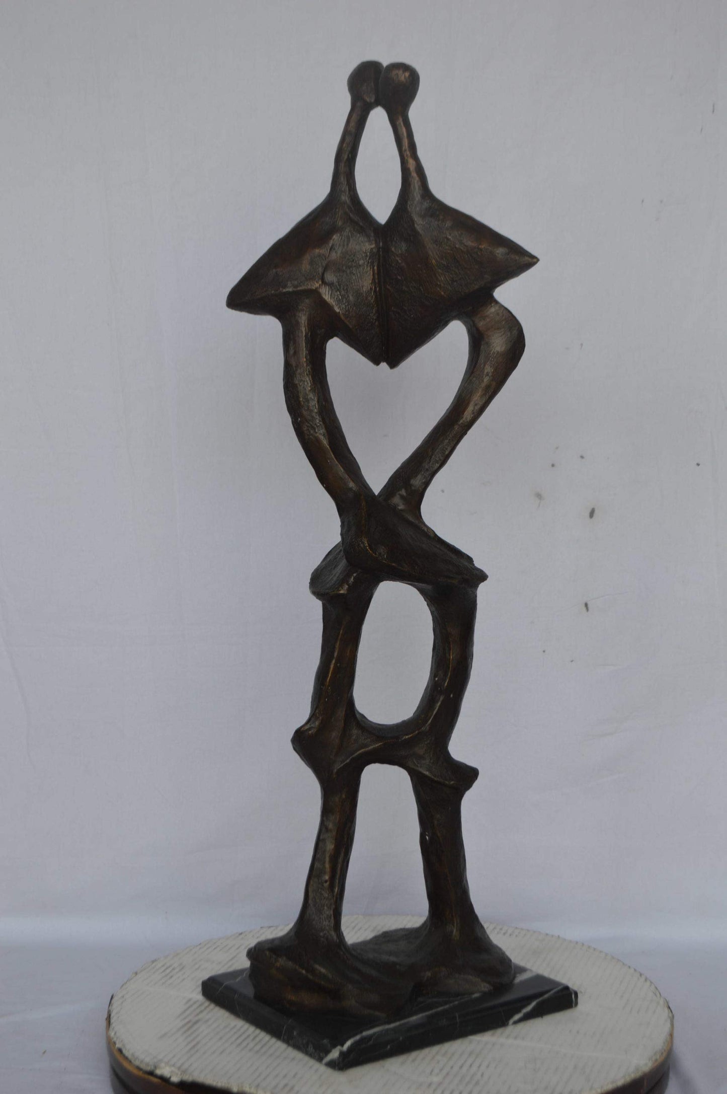 Modern art abstract, a couple kissing bronze statue - Size: 13"L x 11"W x 40"H.