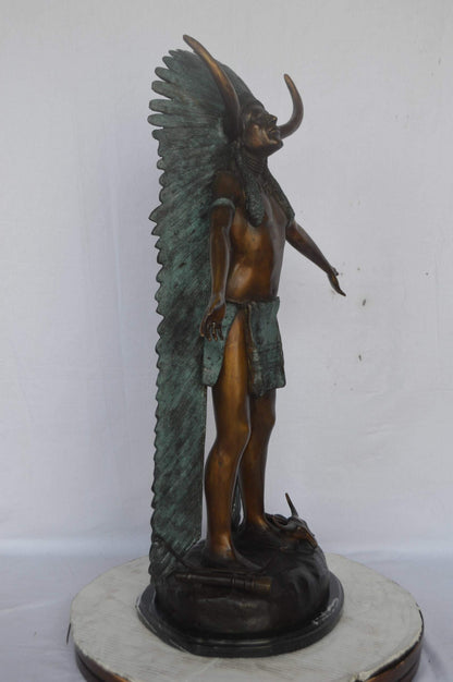 Indian with Plume bronze statue - Size: 22"L x 14"W x 38"H.