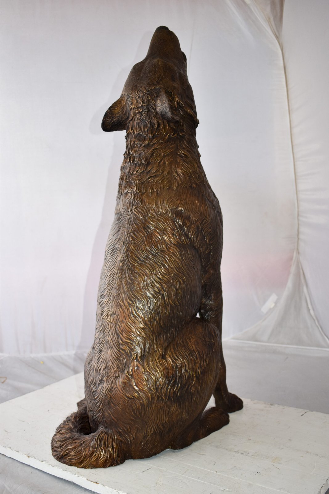 Howling Wolf looking toward the sky Bronze Statue Size: 19" x 19" x 37"H
