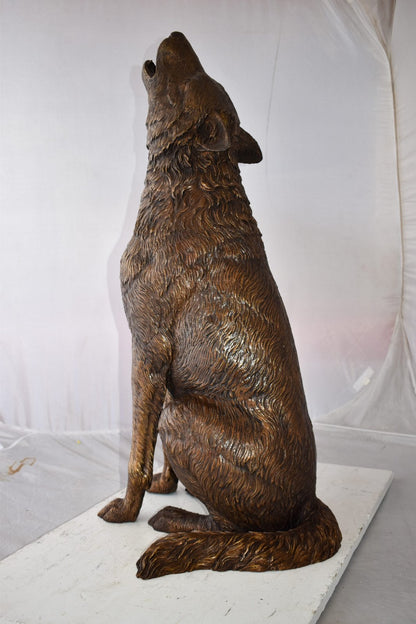 Howling Wolf looking toward the sky Bronze Statue Size: 19" x 19" x 37"H