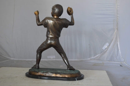 Young Quarterback bronze statue - Size: 14"L x 6"W x 20"H.