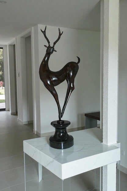Deer standing Bronze Statue -  Size: 12"L x 7"W x 30"H.